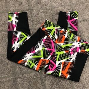 Fabletics tribal penzy print capri legging jogger in neon orange, pink and green